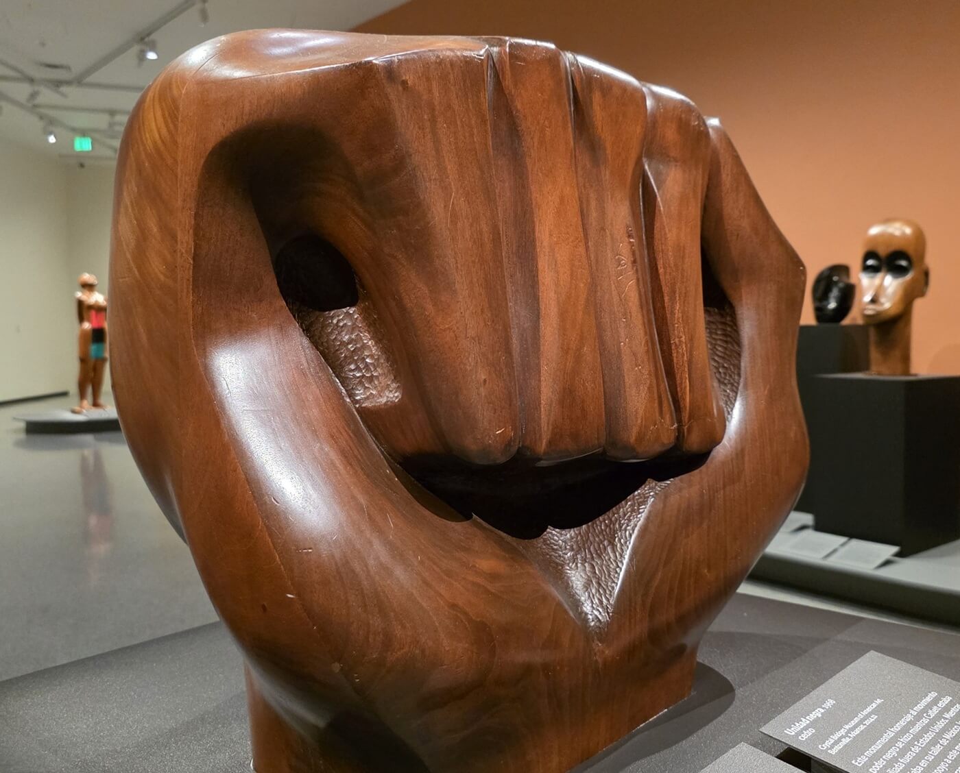 Elizabeth Catlett's cedar sculpture Black Unity, showing a hand forming a raised fist.
